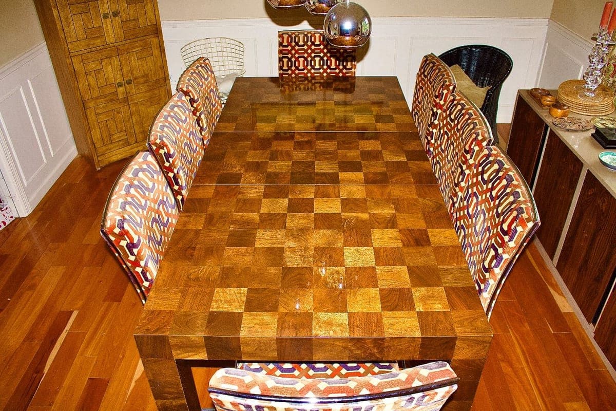 Checkerboard wood dining table and chairs consigned with GoldenTree Estate Sales