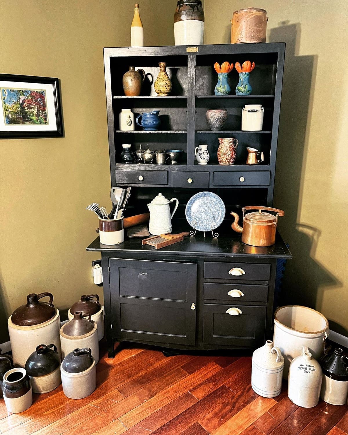 Antique hutch with pottery — estate buy-out services offering immediate cash for valuables in Bucks County, Pennsylvania